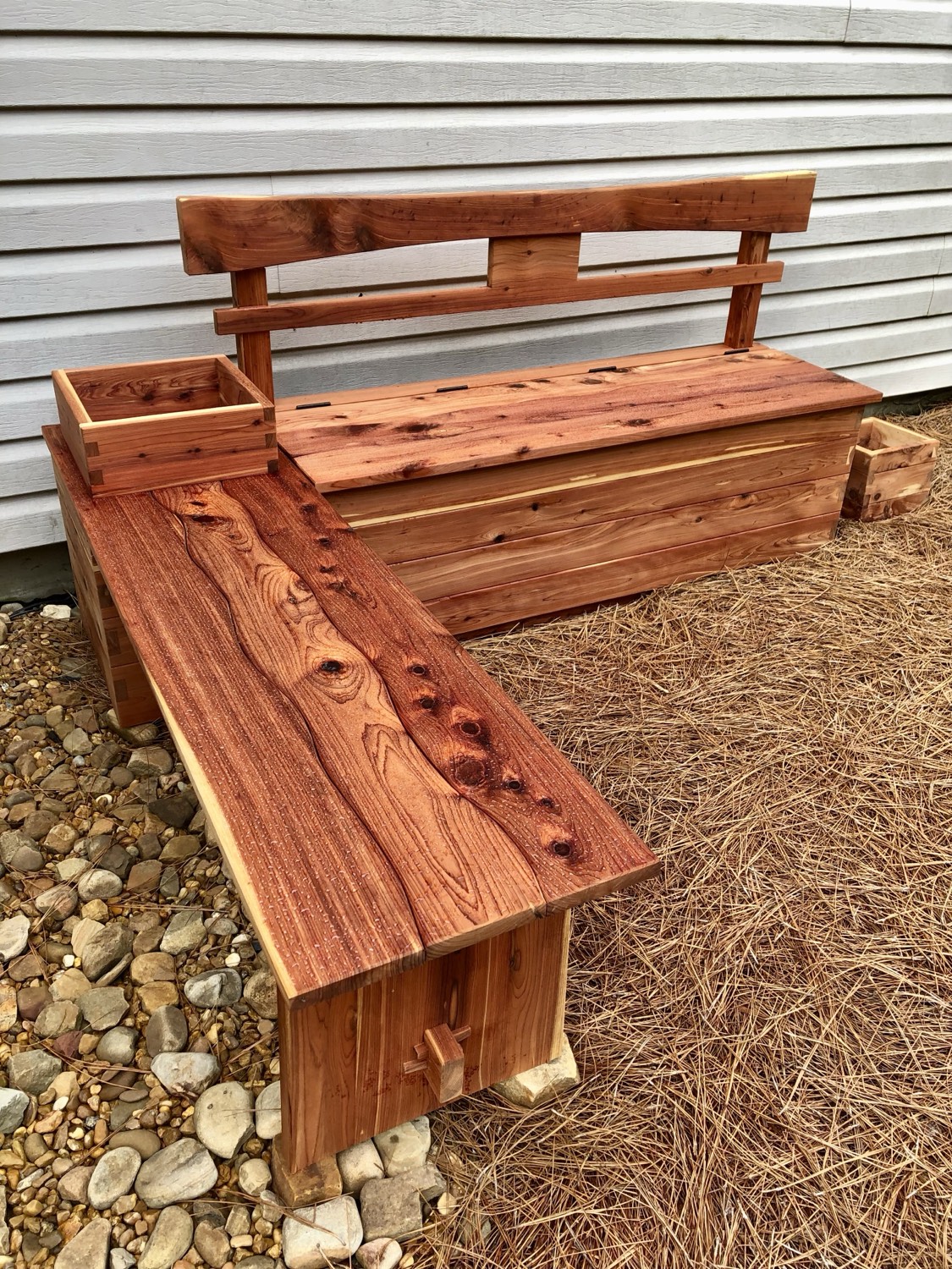 Cedar storage bench with an attached planter box
