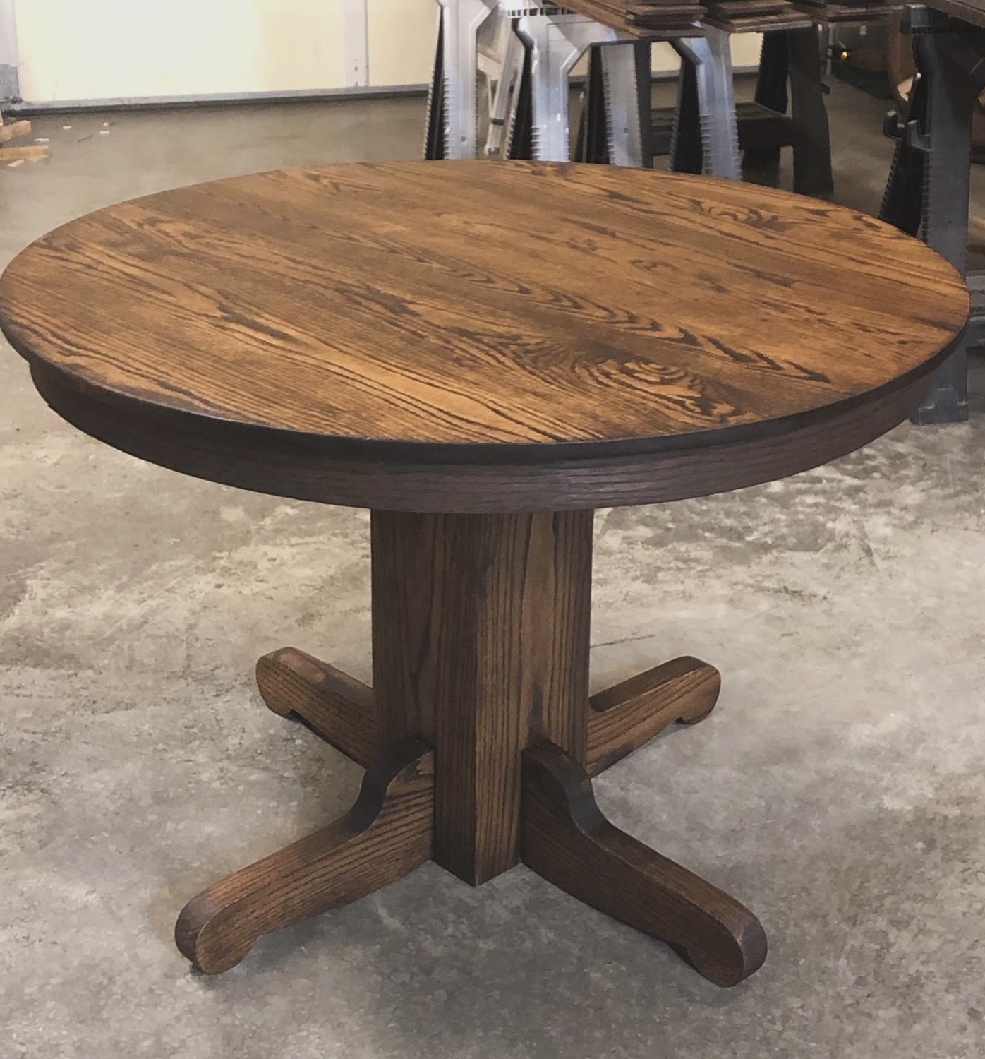 Restored and refinished round oak pedestal table