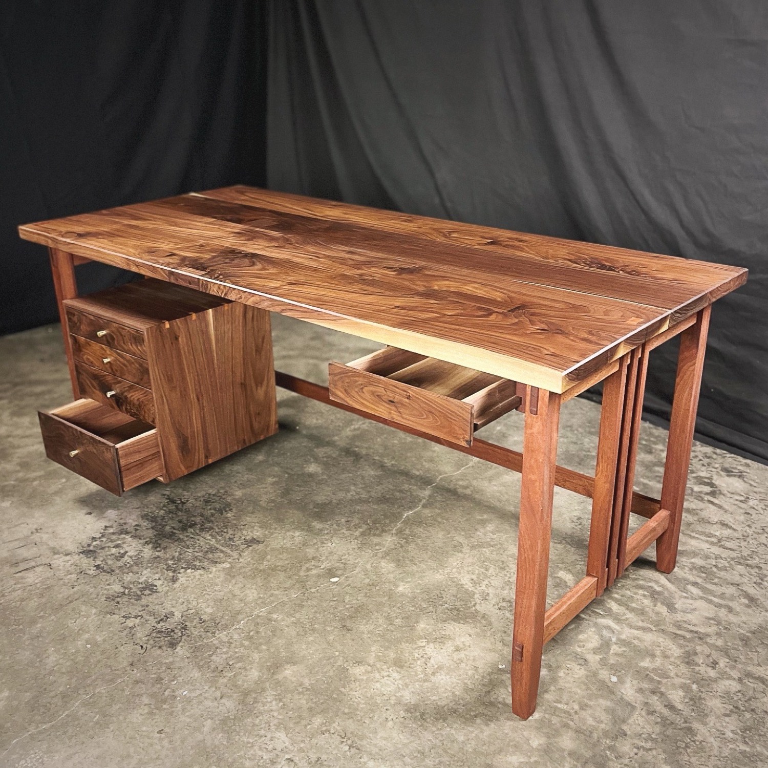 Walnut and mahogany writing desk with hand-cut dovetailed drawers